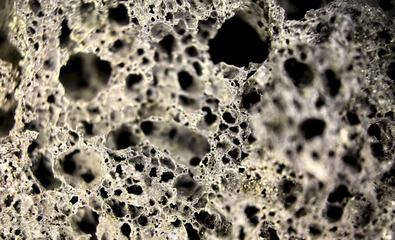 macro-photograph-piece-porous-rock-with-texture-min 3